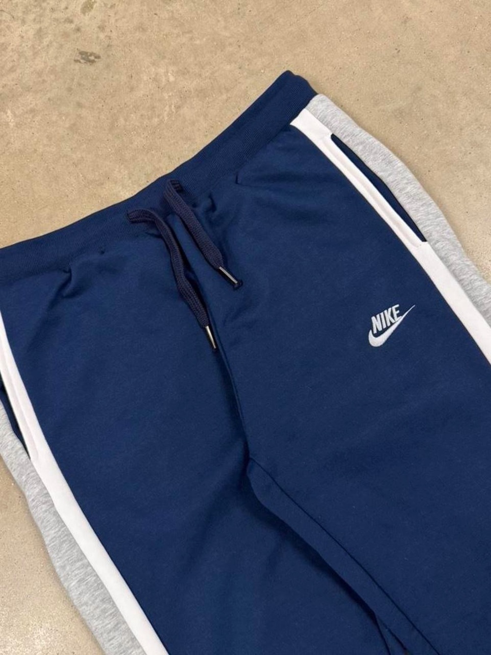 Nike Kids Navy Joggers with White Side Stripe